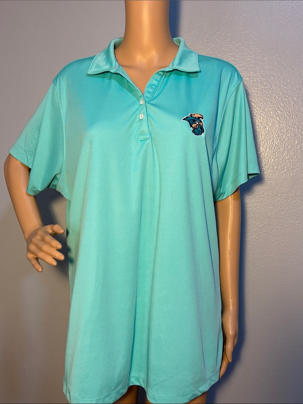 Woman’s Plus Size Teal Polo Shirt with CCU Chauncey Embroidered Logo